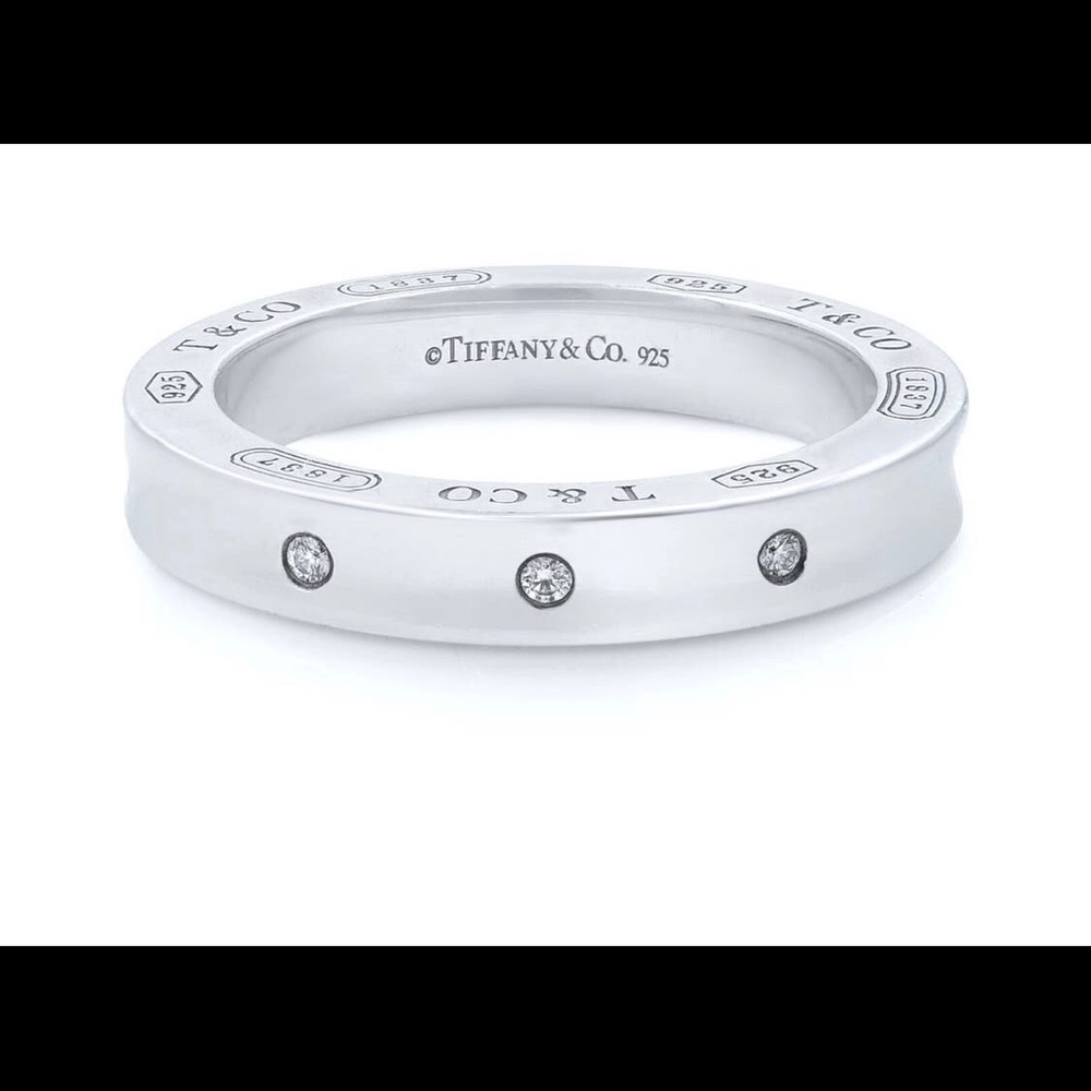 Tiffany and Co. 1837 silver 3 diamond ring.